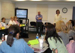 Mary Hynes-Berry and Jeanine Brownell leading one of the first professional development sessions, circa 2007.